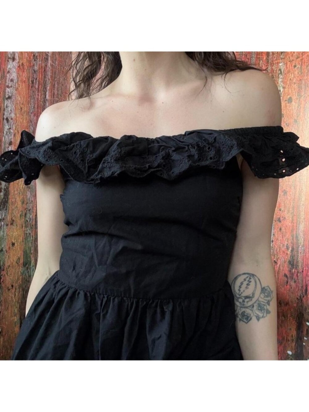 Black cotton maxi dress with ruffles and lace eyelet details